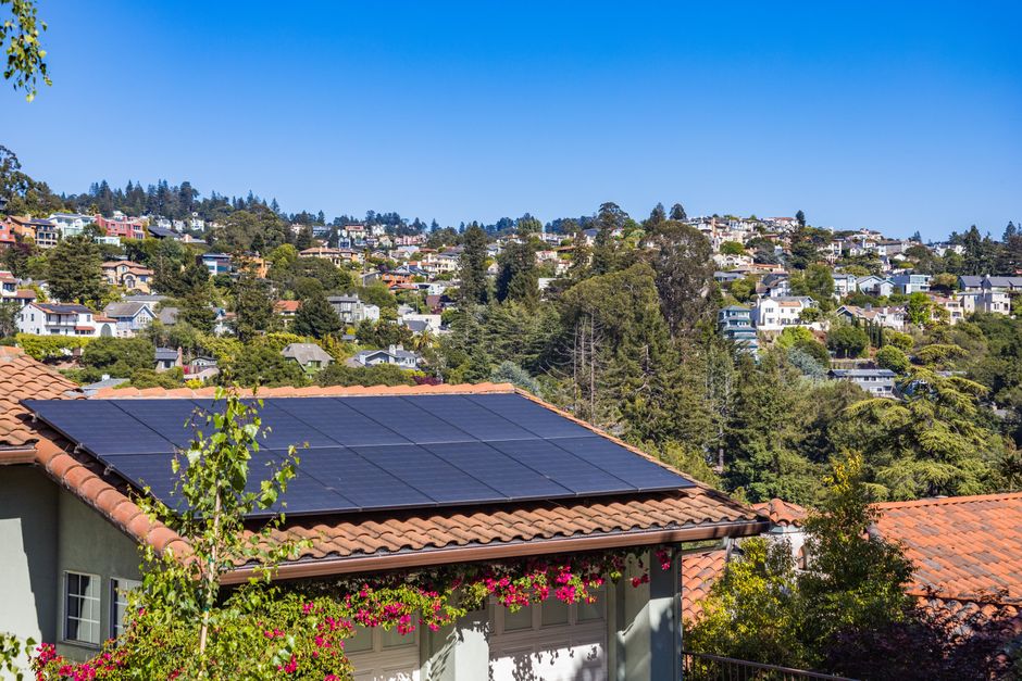 Modern house with residential solar panels installed on the roof